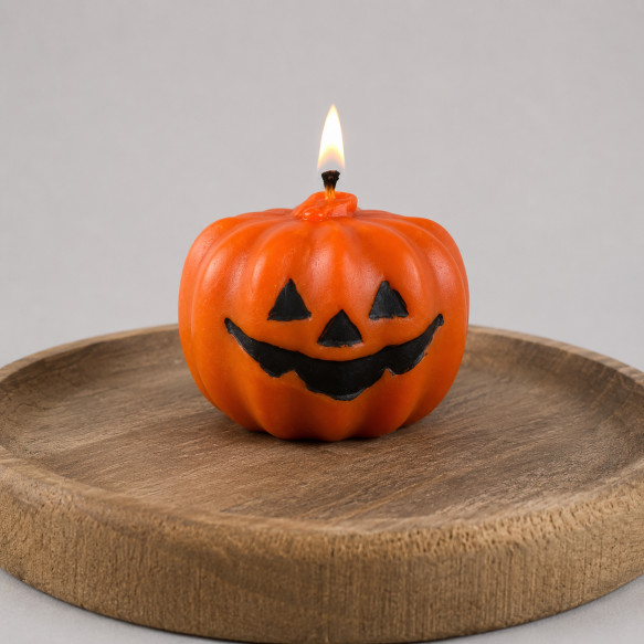 Восковая оранжевая свеча - тыква Halloween